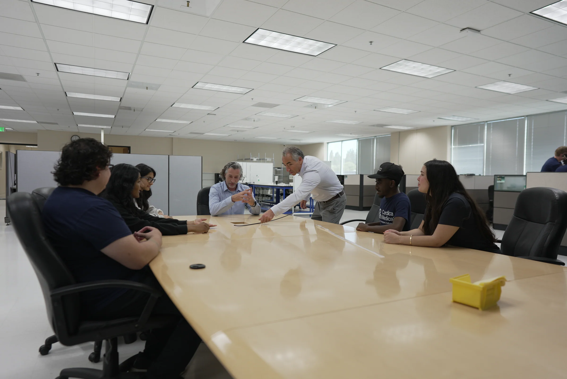Cordica team discussing a medical-device development program