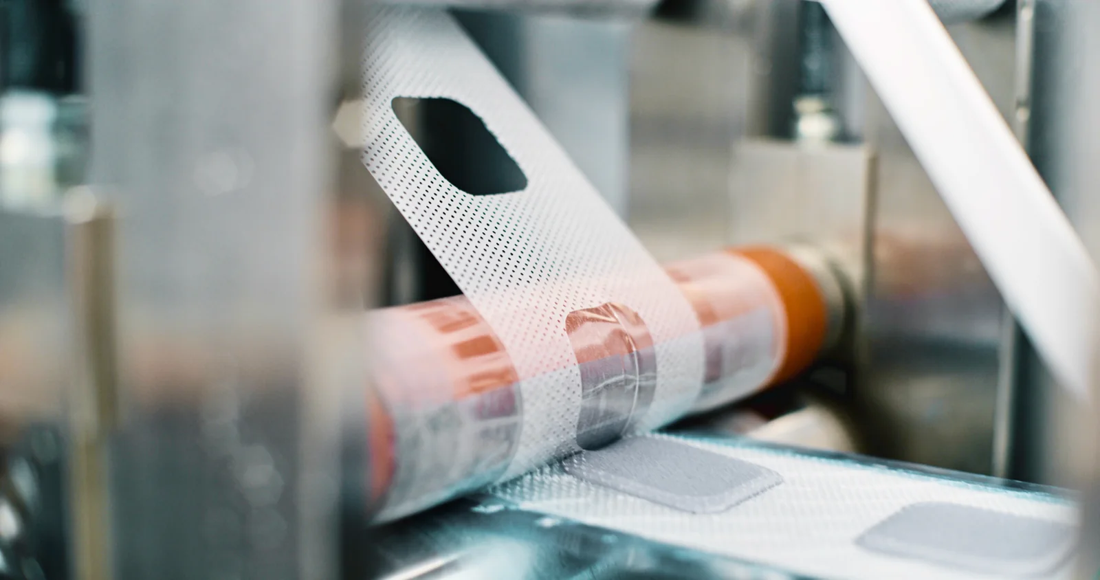 Flexible medical material being processed on a converting line