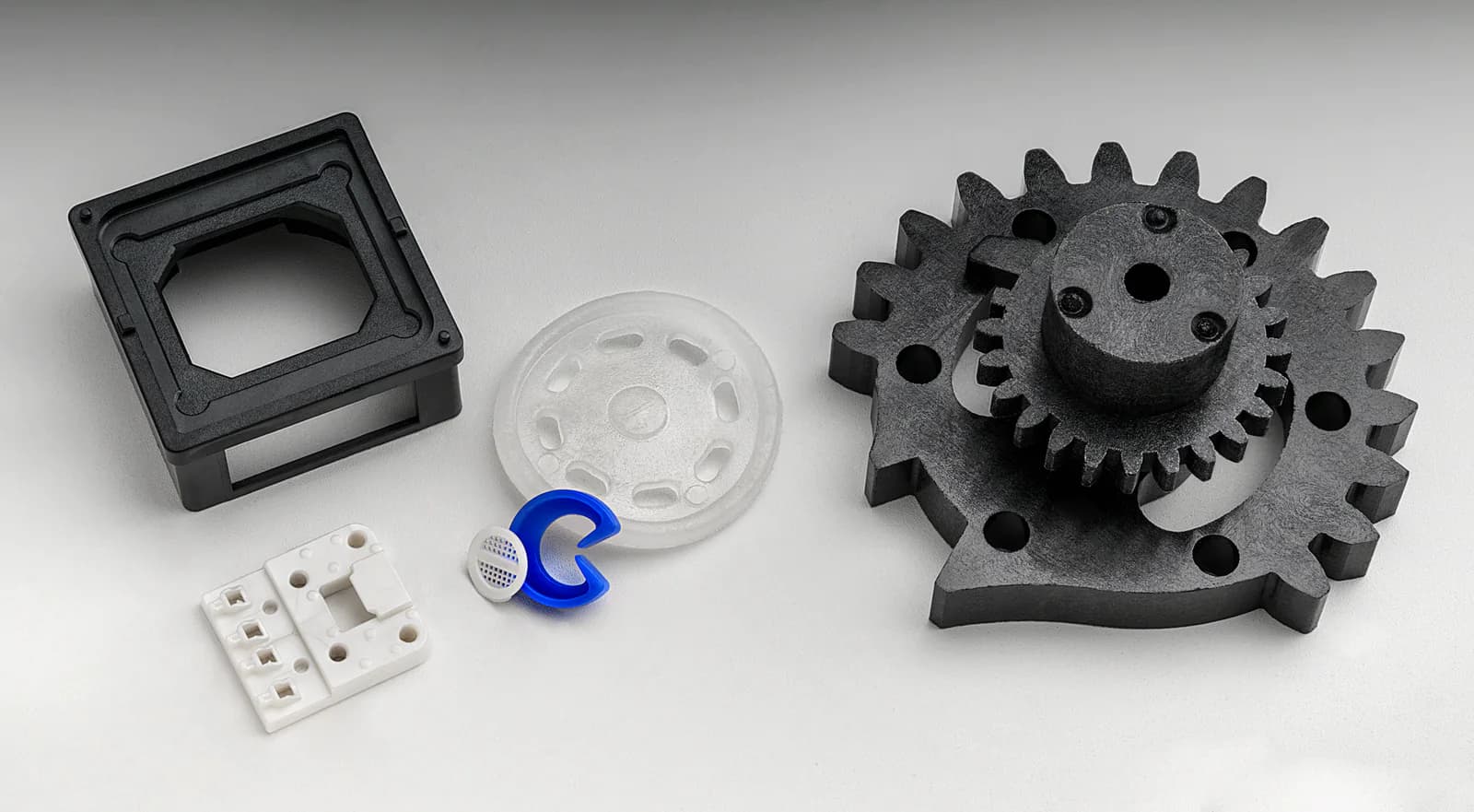 Precision-molded medical components arranged for handling and assembly