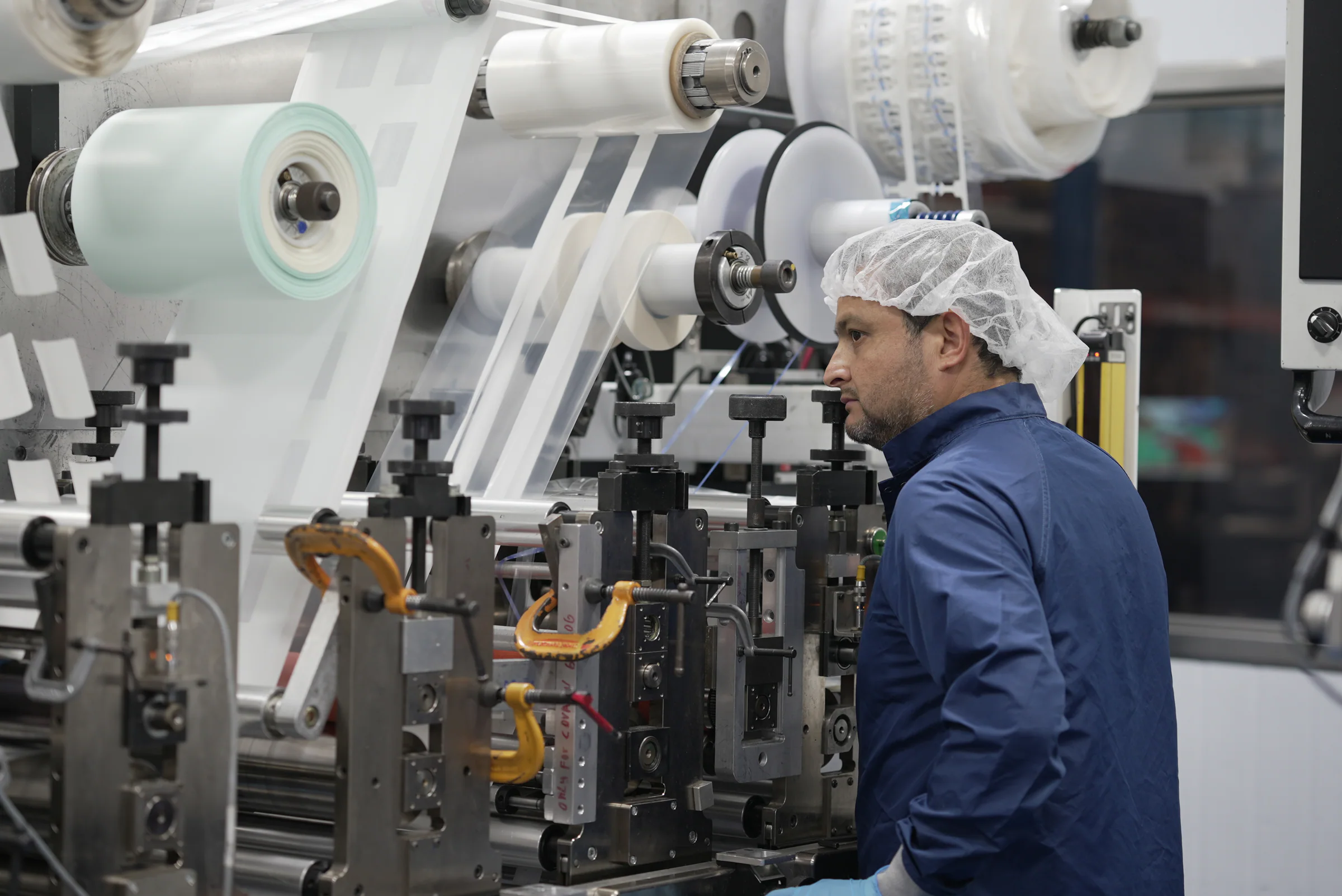 Cordica operator monitoring roll-to-roll medical converting equipment